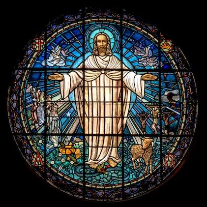 circular stained glass with Jesus